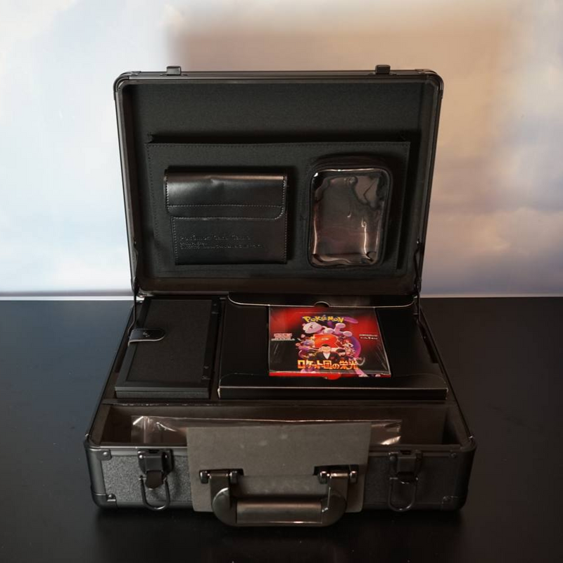 Maletín + Caja 30 Sobres Glory of the Rocket Team Pokemillon 002