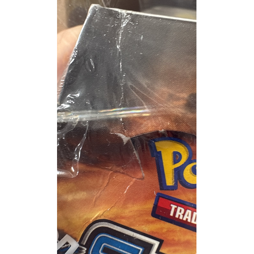 Caja sellada de 36 sobres Pokémon XY Steam Siege con diseño en tonos naranja y negro, envuelta en plástico protector.
