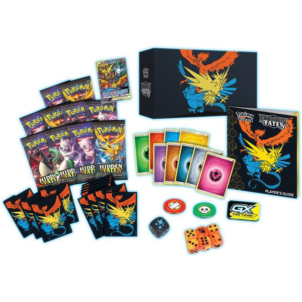 Caja de entrenador élite Pokémon Hidden Fates con sobres, guía del jugador, dados, contadores y cartas de energía brillantes.