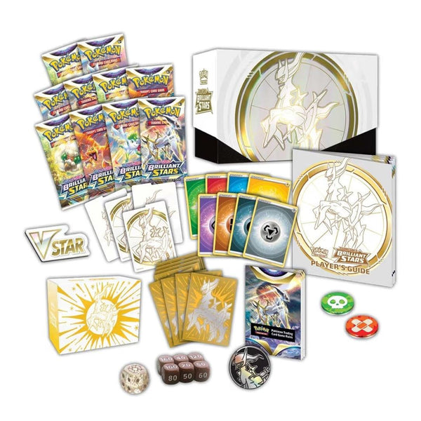 Caja de entrenador élite Pokémon Astros Brillantes con sobres, cartas de Arceus, dados, marcadores y guía de juego.