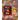 Caja de colección Pokémon 30th Celebration con figura de Charizard y carta jumbo holográfica en fondo naranja y dorado.